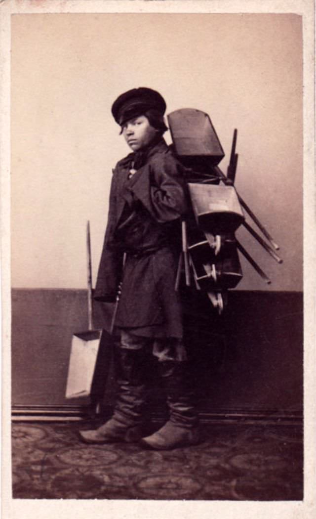 Boy selling wheelbarrows