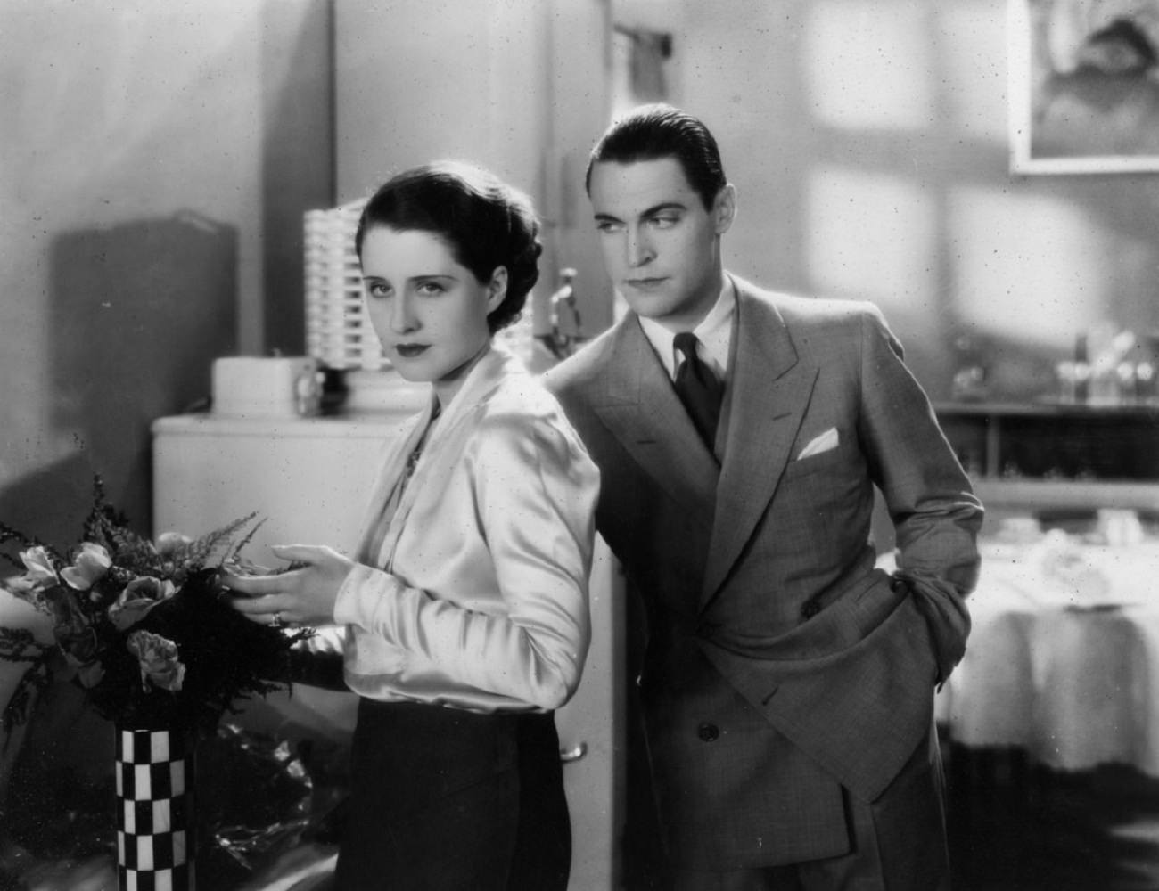 Norma Shearer and Chester Morris in The divorcee, 1930
