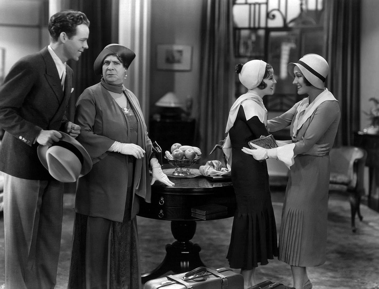 Arthur Lake, Maude Eburne, Barbara Kent and Gloria Swanson in Indiscreet, 1931