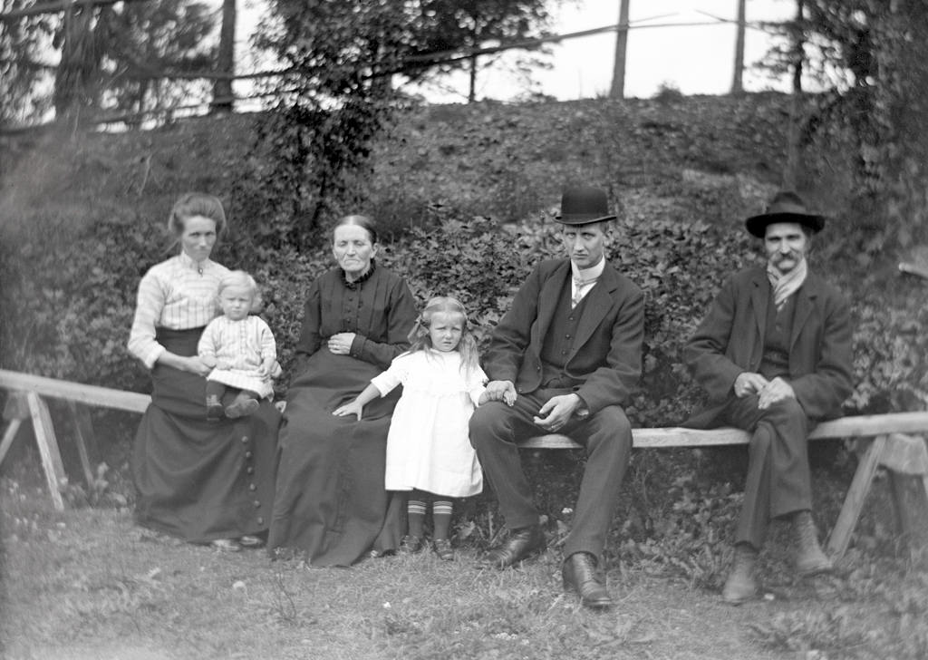 Family gathered on the bench.