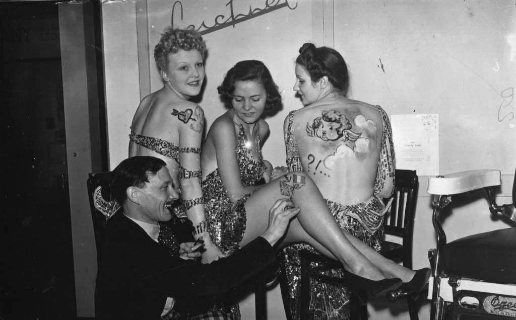 women getting tattooed