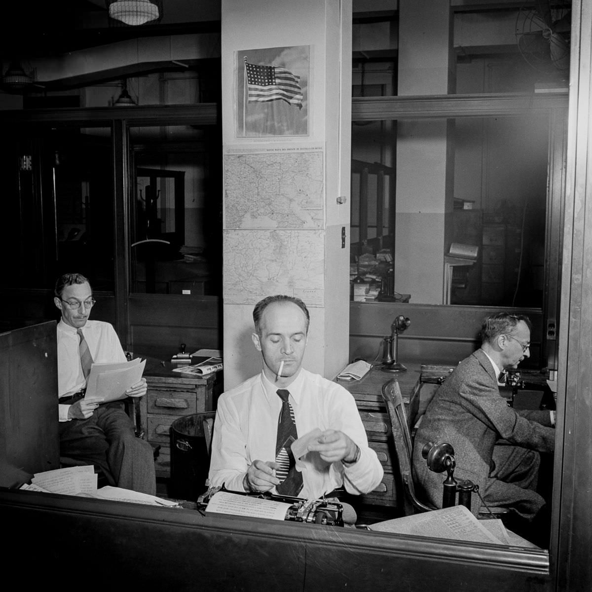 Copyreaders at the telegraph desk, which handles all U.S. news outside of the city.