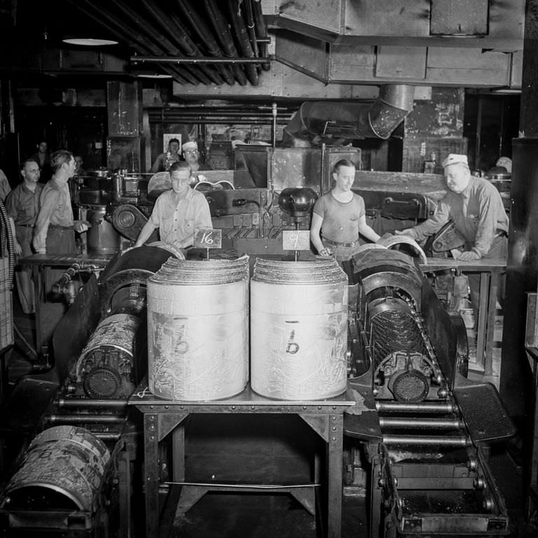 Plates are loaded into the presses before they start rolling.