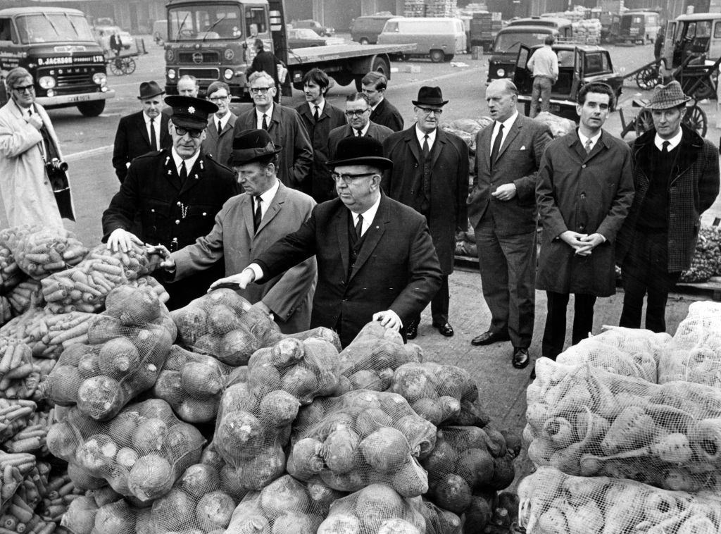 Members of Liverpool's environmental health and protection committee inspecting iverpool city market.