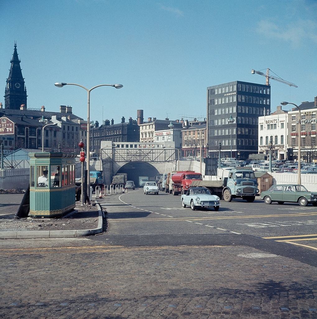 Cars and trucks entering and exiting from the Queensway road tunnel in Liverpool, 1973.