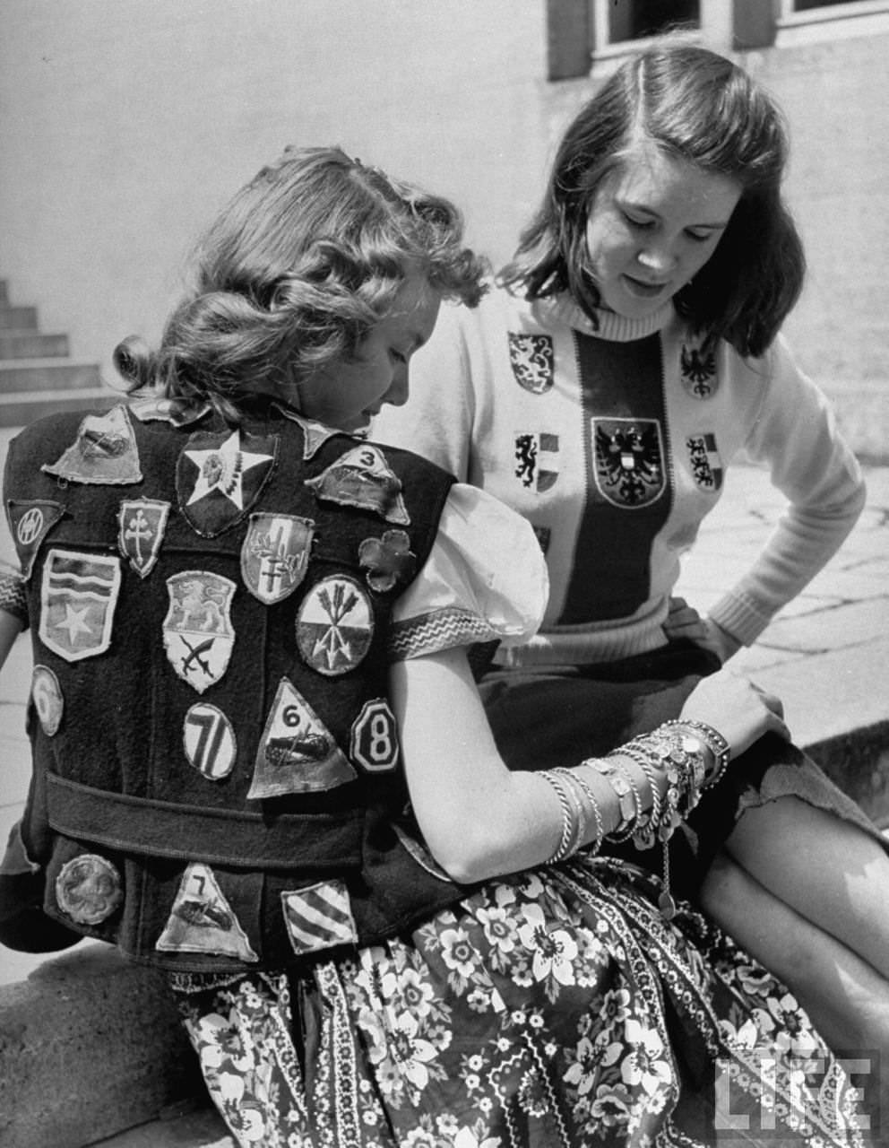 Army patches and German coats of arms, worn by American teenagers.