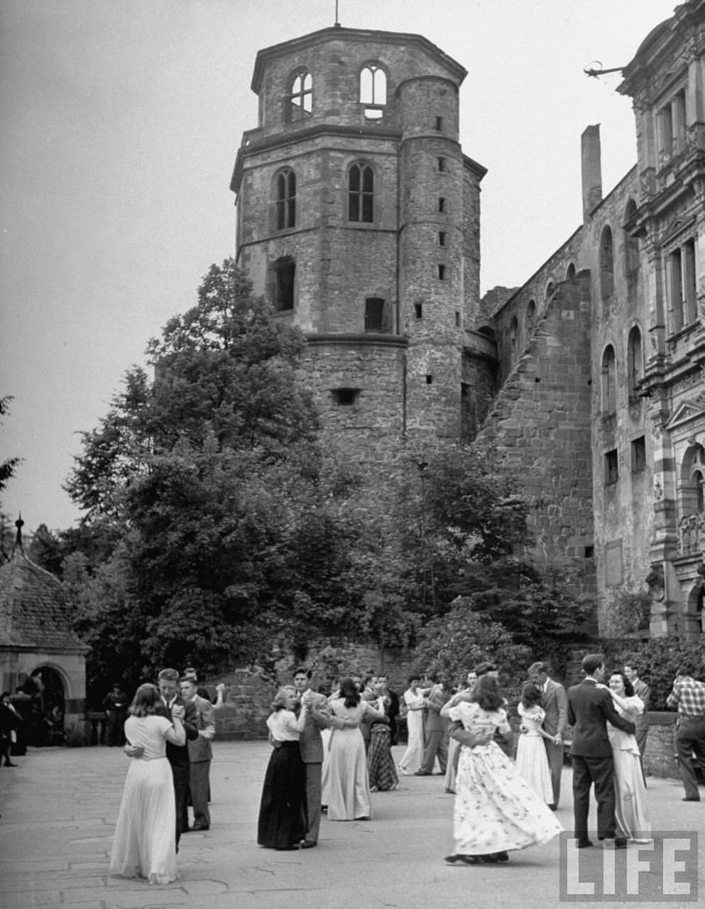 American students impromptu dance on terrace of castle.