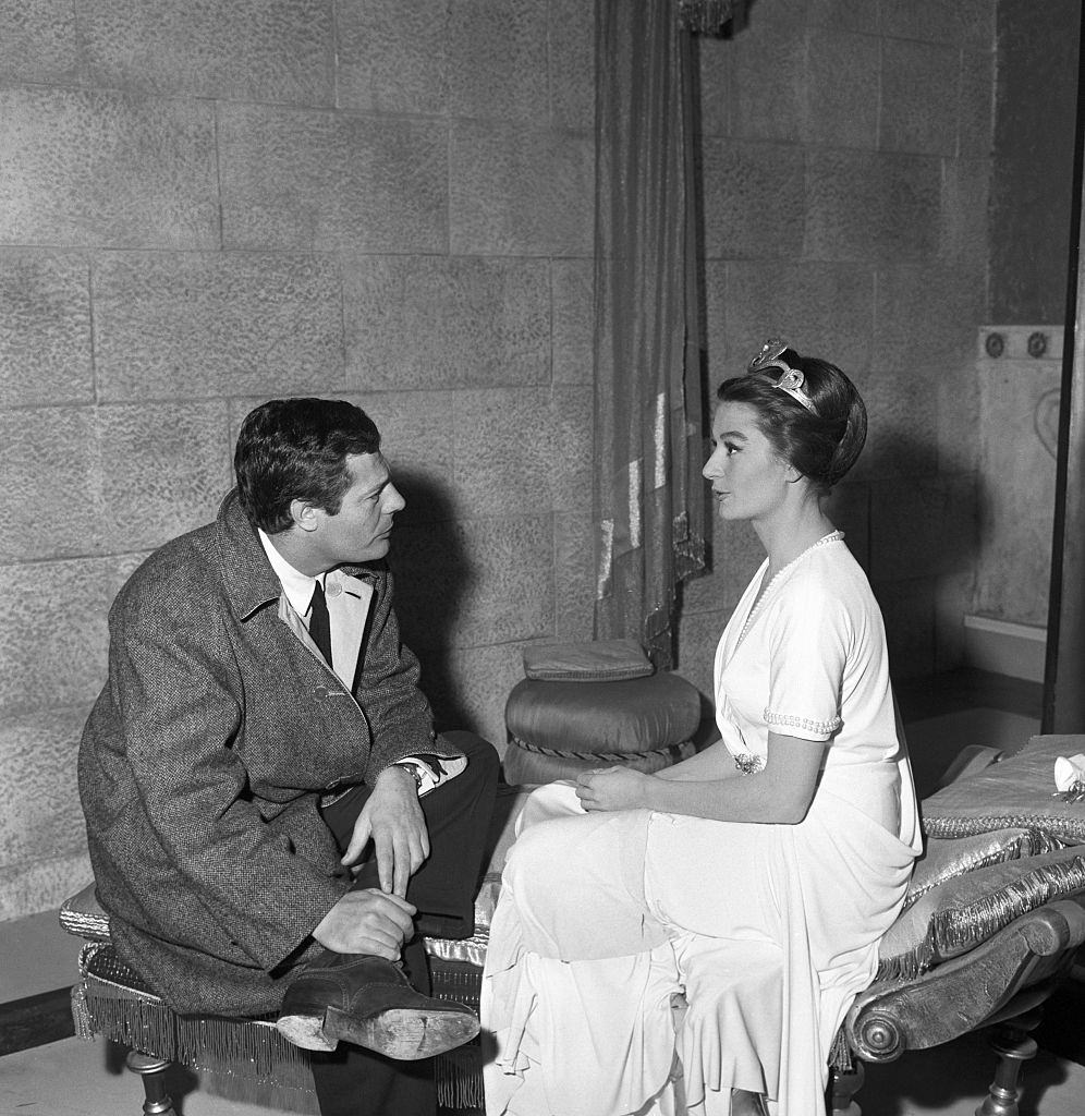 Anouk Aimée with Marcello Mastroianni on the set of the film Sodom and Gomorrah, 1956.