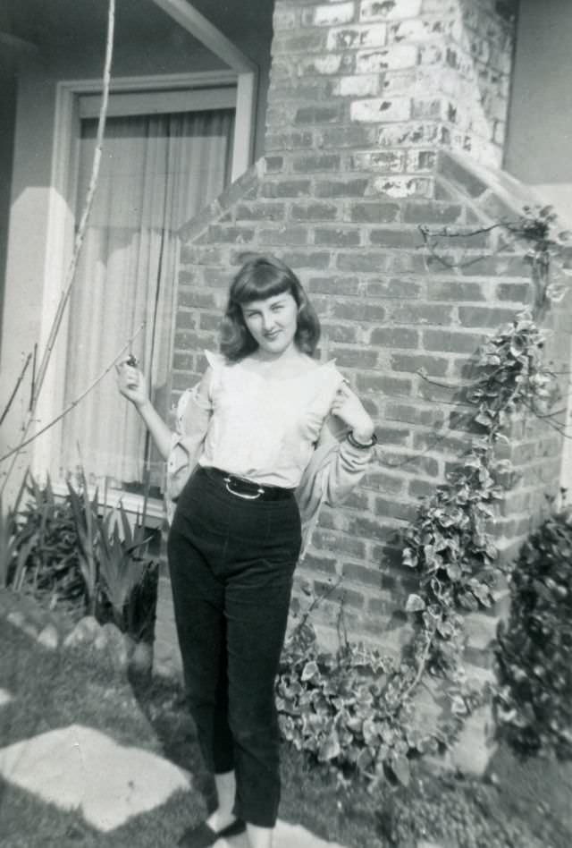 Teenage girl posing outside