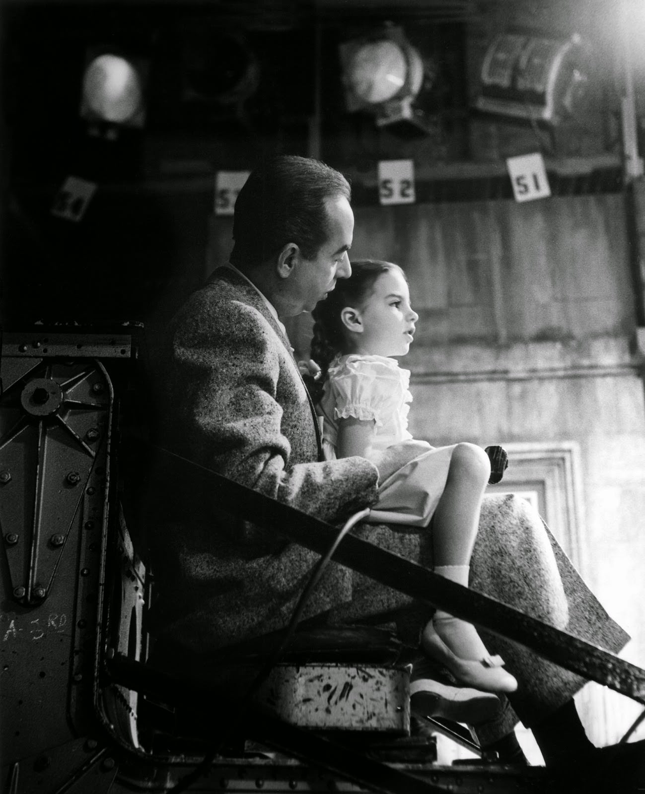 Vincente Minnelli high on the Chapman crane, takes his daughter Liza Minnelli for a ride on the MGM set of "Lovely to Look At," 1951