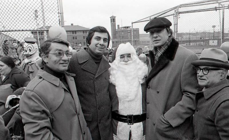 Men with Santa Claus at North End Christmas Parade and Party