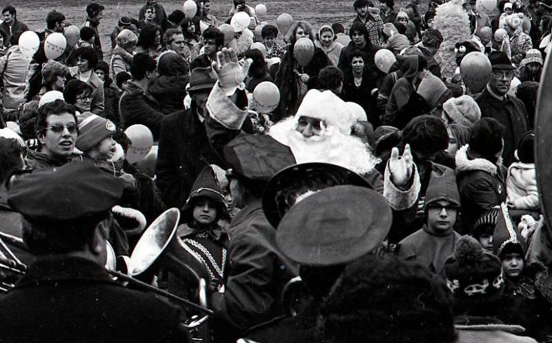 Santa Claus with crowd at the North End Christmas Parade and Party