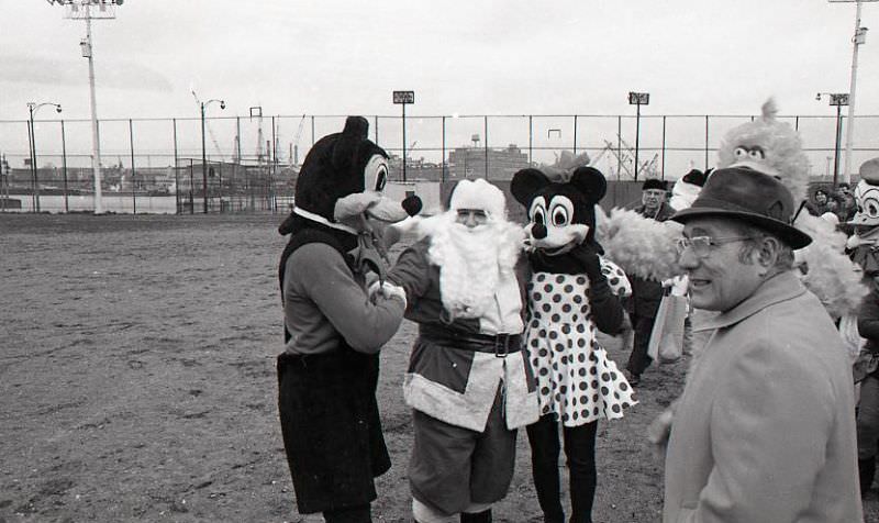 Mickey Mouse and Minnie Mouse with Santa Claus at North End Christmas Party and Parade