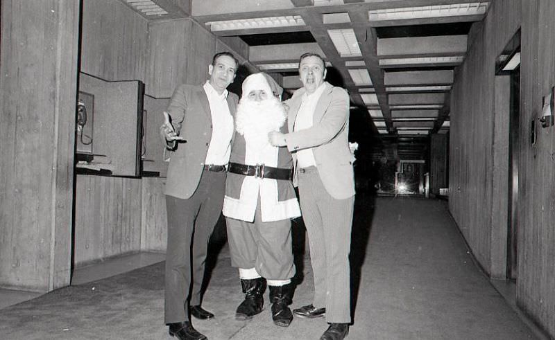 Men with Santa Claus at City Hall after North End Christmas Parade and Party