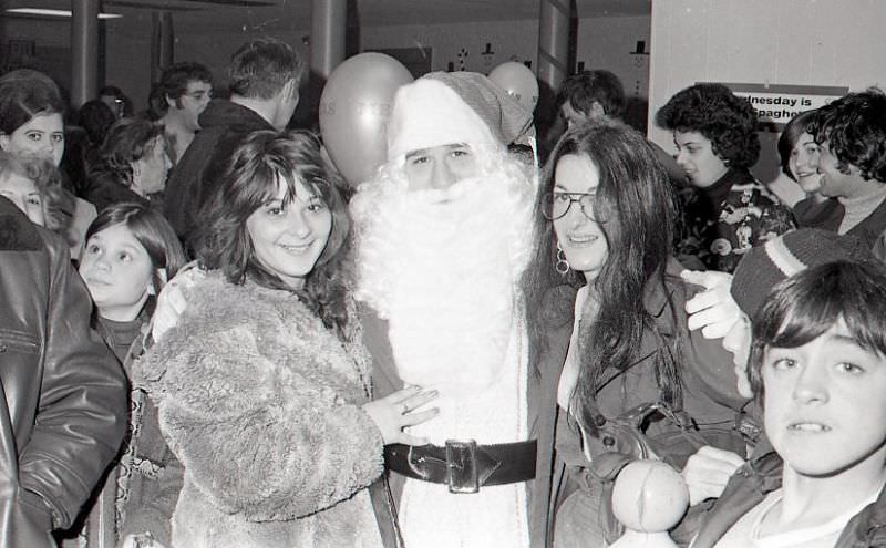 Women with Santa Claus at North End Christmas Party