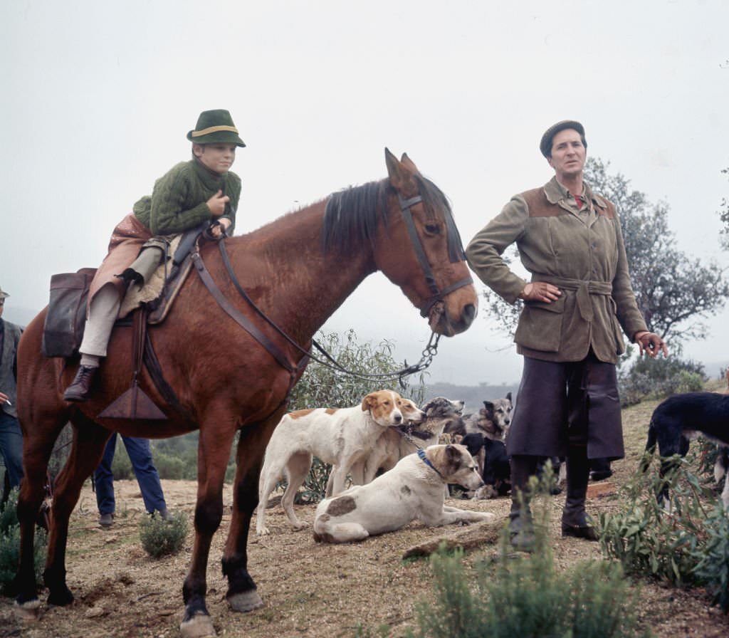 Spanish bullfighter Luis Miguel Dominguin with his son Miguel in his farm of La Paz, Saelices, Cuenca, Spain, 1965.