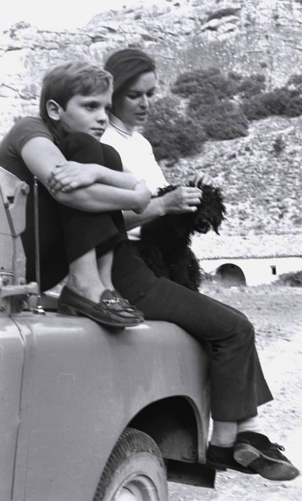 Italian actress Lucia Bose with her son Miguel on her estate "Villa Paz, Saelices, Cuenca, Spain, 1967.