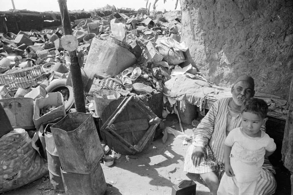 Old man and a child in a slum in the suburbs of Cairo in October 1978, Egypt.