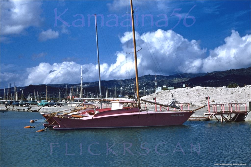 The Hawaiian Village Hotel’s "Kaiser Pink" catamaran Ale Ale Kai III moored at neighboring Ala Way Harbor, 1950s