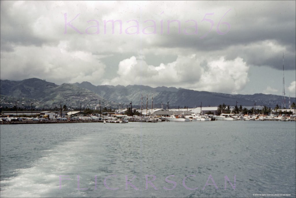 Looking inland from a boat leaving Kewalo Basin on Oahu's south shore, 1960