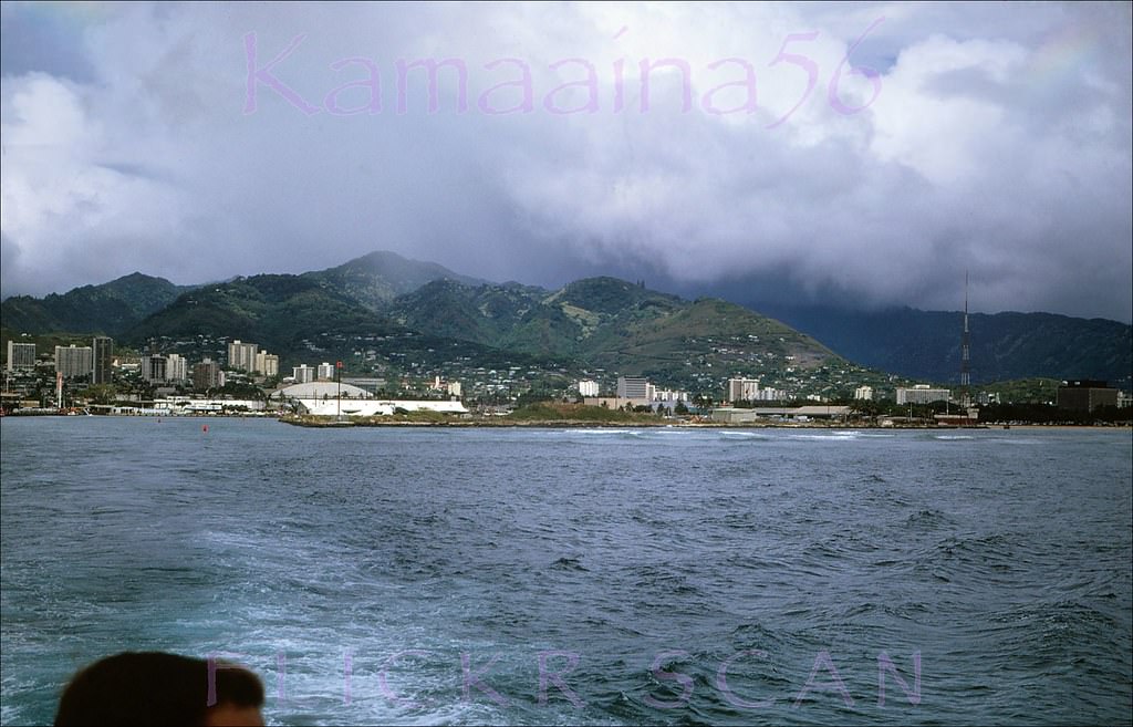 Mauka (inland) view from a cruise boat leaving Kewalo Basin on Oahu’s south shore probably headed for Pearl Harbor or possibly Waikiki, 1968