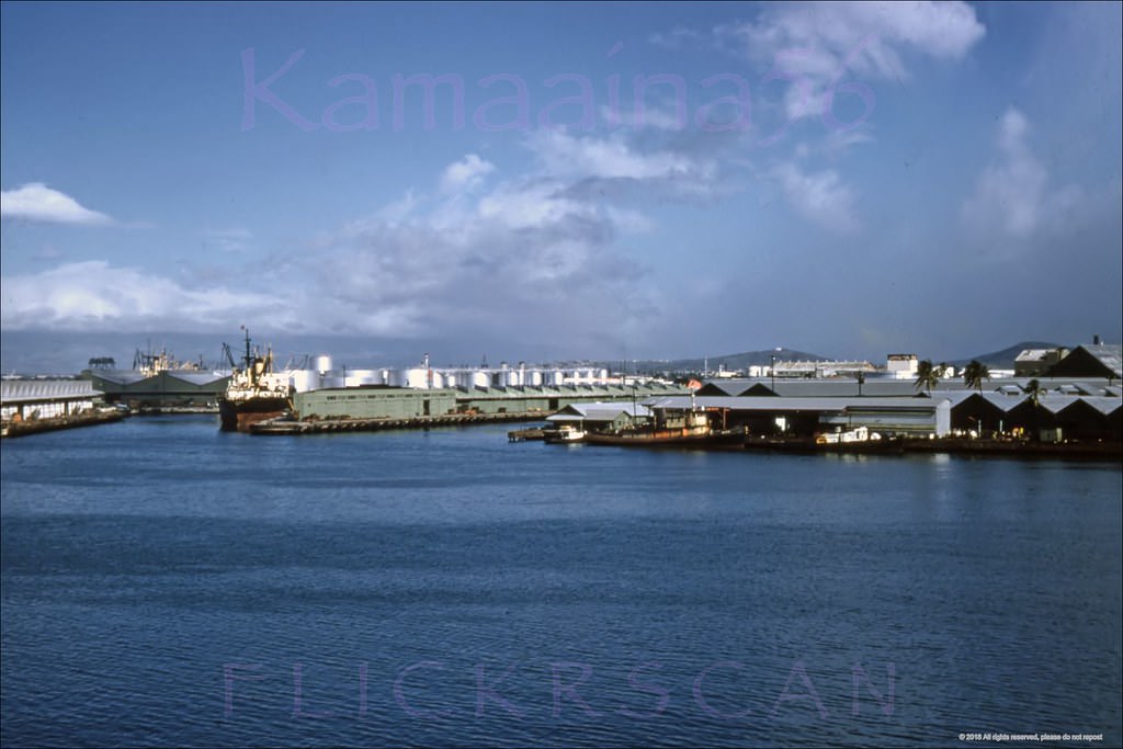 View of the west side of Honolulu Harbor, probably taken from the Aloha Tower observation deck, 1950s