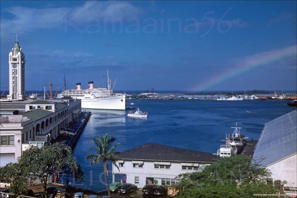 Matson Lines flaghip SS Lurline being nudged into Pier 11 at Honolulu Harbor, 1950