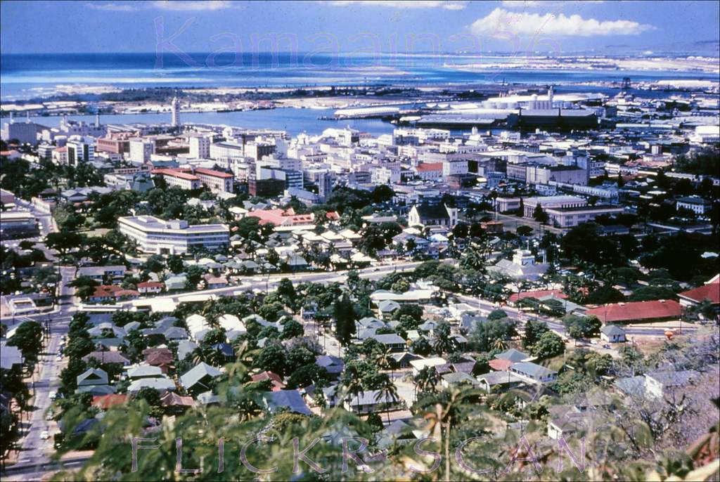 Panoramic view of downtown Honolulu, the harbor area, and Sand Island from Punchbowl Crater, 195s