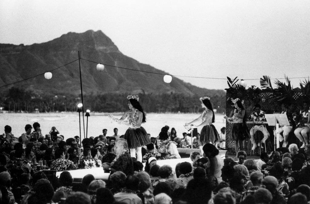 Traditional Hawaiian dancers on the terrace of the 'Royal Hawaiian Hotel' in Waikiki, Honolulu, Oahu, Hawaii, 1970s