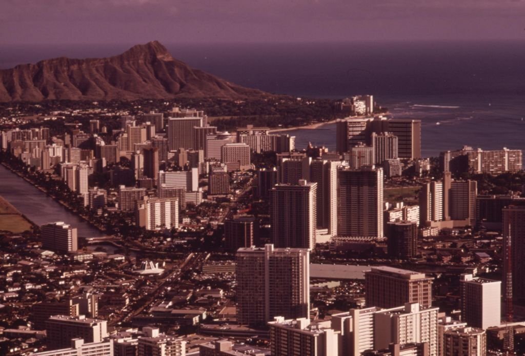 Aerial view of Honolulu looking east toward Diamondhead, the extinct volcano, Honolulu, Hawaii, October, 1973.