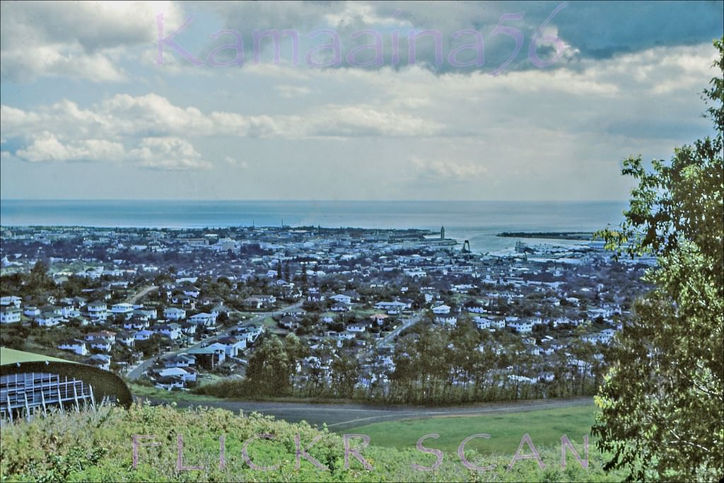 Looking makai at downtown Honolulu and Honolulu Harbor from the hills above Kamehameha School’s Kapalama campus, 1950s