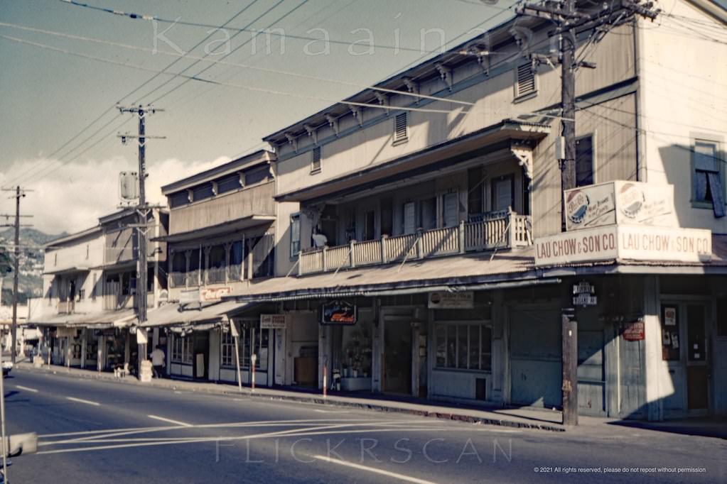 Long gone view from the corner of Kukui Lane looking mauka (inland) at the old wooden buildings that used to line Honolulu’s Nuuanu Avenue, 1959