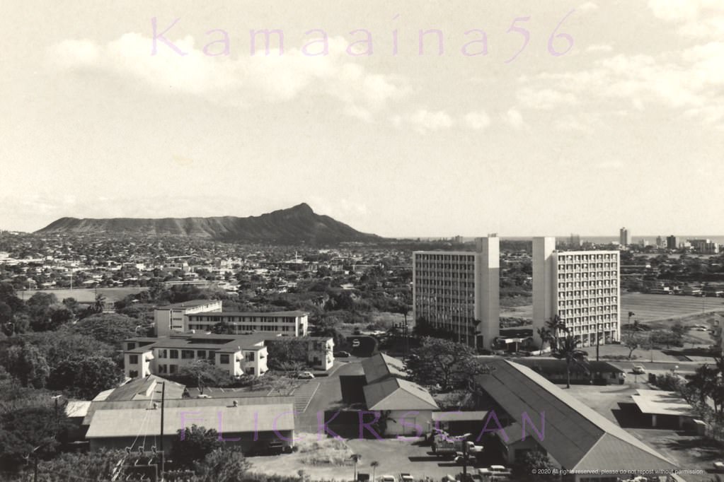 Looking more or less south over the University of Hawaii’s Manoa Valley Campus towards Honolulu and Waikiki with Diamond Head Crater in the distance, 1960s