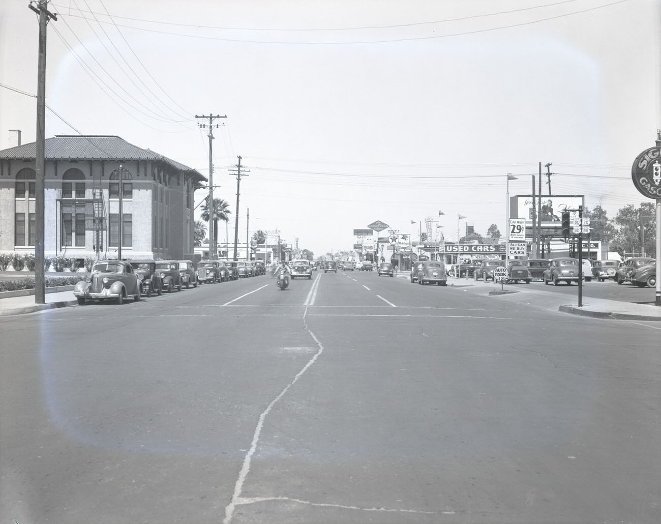 W. Van Buren Street. 1942. View looking west toward the intersection of Van Buren and Third Ave.