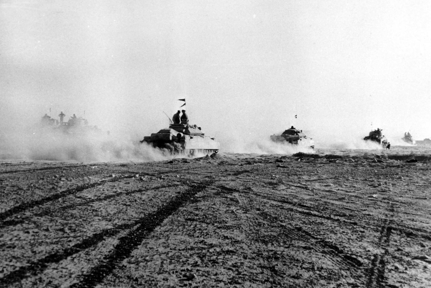 British tanks advancing in the desert during the battle of El Alamein, 1942