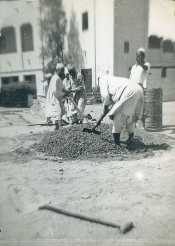 Mixing concrete, Egypt