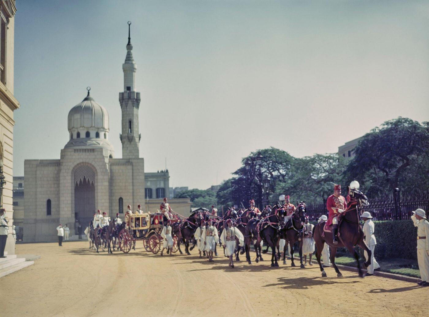 King Farouk of Egypt (1920-1965) is transported by horse drawn carriage in a royal procession arriving for the state opening of Parliament in Cairo, Egypt in 1945