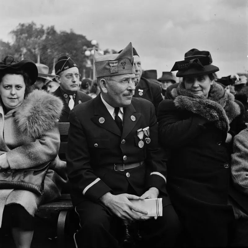 Ceremonies at the presentation of the Army and Navy “E” (for efficiency) award to the Briggs manufacturing company. Worker who is a war veteran, near Detroit, Michigan, September 1942.