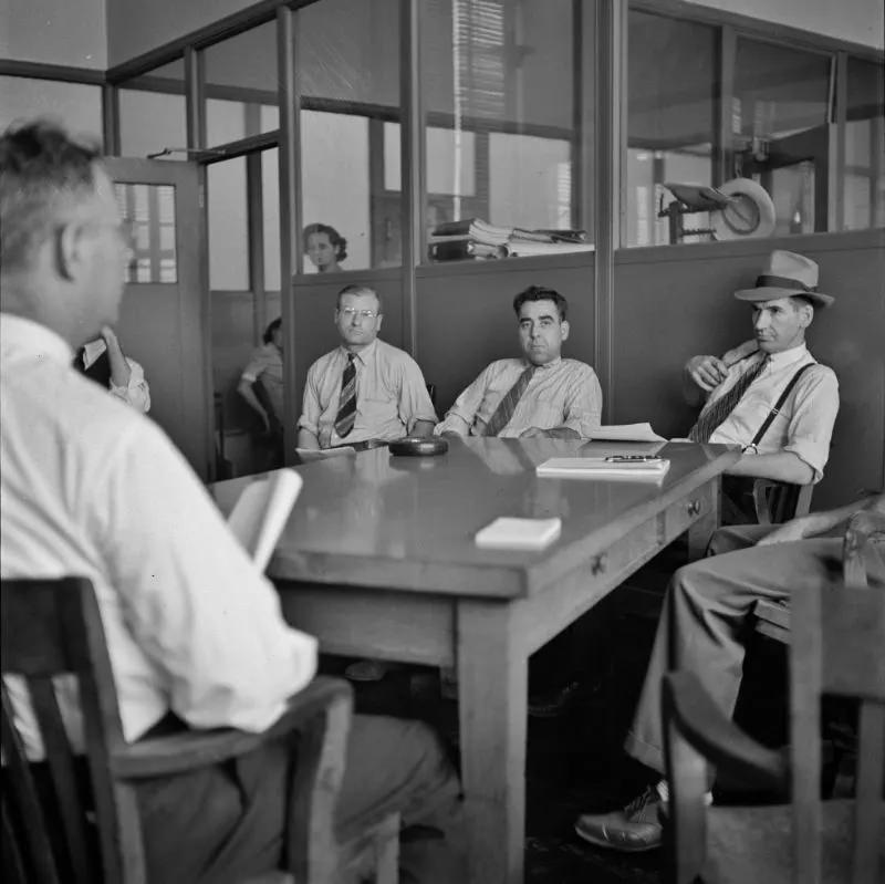 Chrysler Corporation Dodge truck plant. One of many conferences about production schedules, blueprints, etc. are required to maintain the smooth steady flow of Dodge Army trucks, 1942.