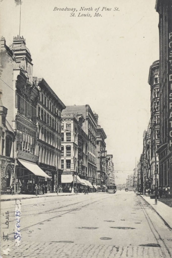 The building housing the St. Louis Post-Dispatch newspaper can be seen in the view of Broadway, nroth of Pine Street, St. Louis, 1900