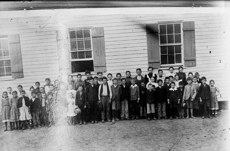 Group of school-age children, 1900