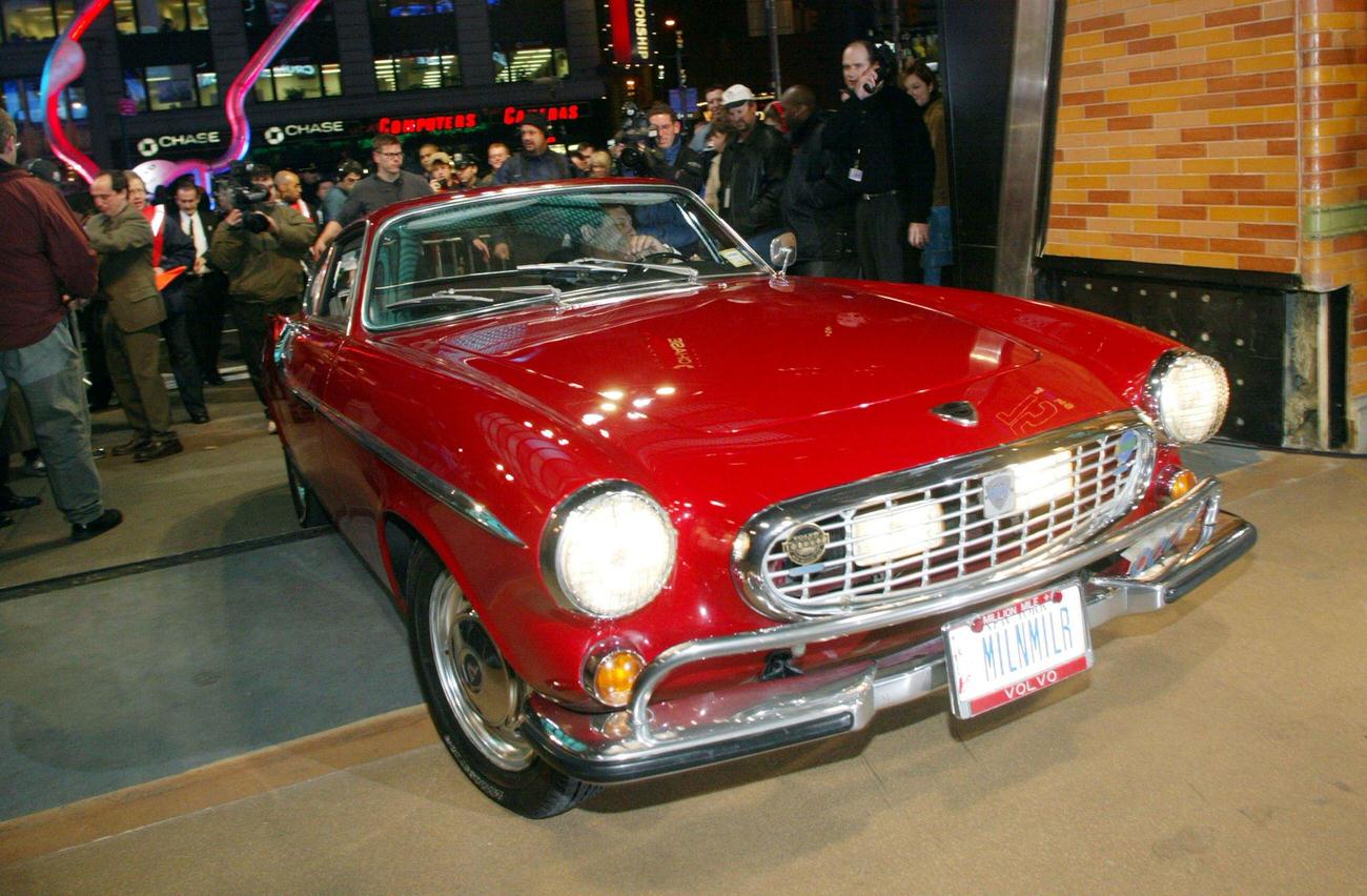 Irv Gordon drives his 1966 Volvo P1800 at the Volvo 75th Anniversary event March 27, 2002 in New York City.