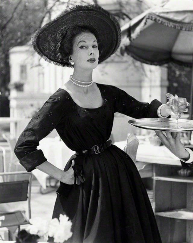 Barbara Goalen in a Hardy Amies town dress, photo by John French for the Daily Express, London, 1952.