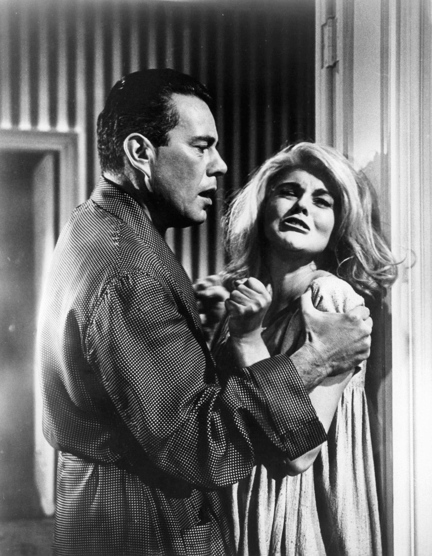 John Forsythe attempts to subdue Ann Margret in a scene from the film 'Kitten With A Whip', 1964.