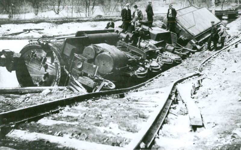 Railroad engine after tracks undermined by flood, Massillon, Ohio, 1913