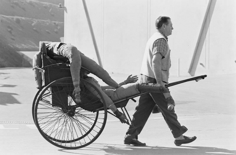 A prop man pulled a cart at the Universal lot, Hollywood, 1963.