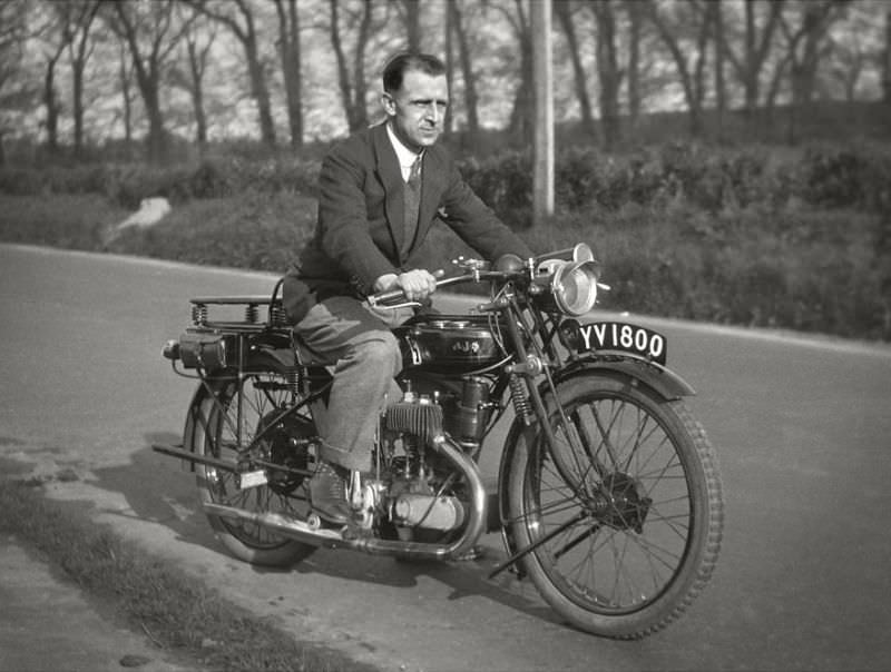 AJS motorcycle at Wroxham, Norfolk Broads, England, 1929