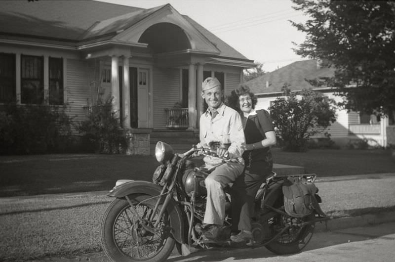 Couple on a Harley-Davidson motorcycle, circa 1940s