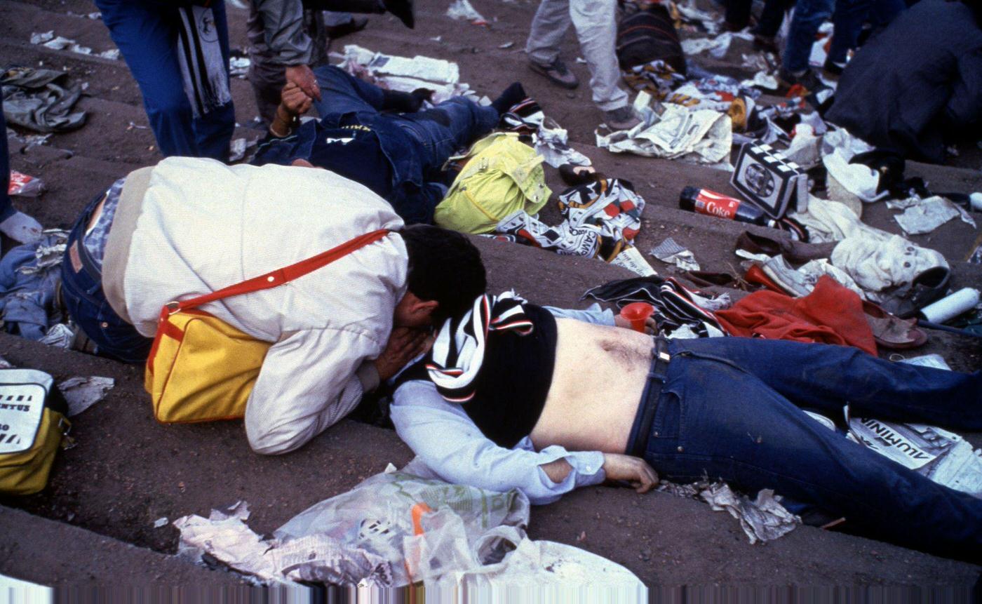 A Juventus Supporter Tries to Revive an Injured Friend, European Cup Final, 1985.