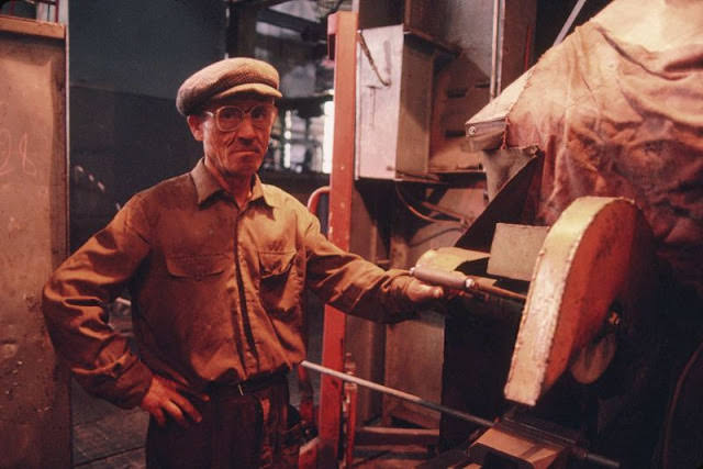 A worker operates a press at the Lviv Bus Plant (Lvivsky Avtobusny Zavod, or LAZ), Ukraine, 1991